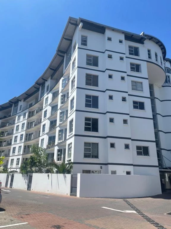 The white curved exterior of SPLICE RIVIERA in Johannesburg